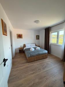 Casa Sabo Sannicoara Cluj Airport Area 2 room gray apartment