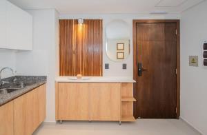 Stylish Stay with Private Patio Pool & Gym Access