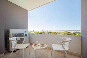 Executive Retreat with Balcony Sauna and Pool
