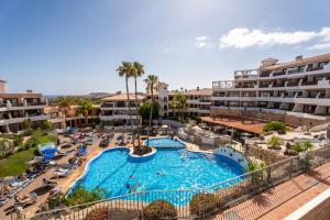 Sunny Terrace with Heated Pool View