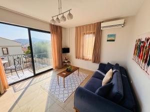 Aden Aparts - Central Kalkan 1 bedroom Flat with Pool & Sea View