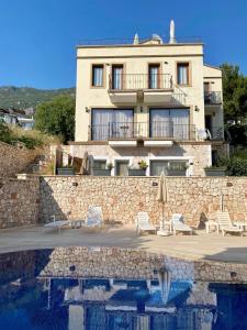 Aden Aparts - Central Kalkan 1 bedroom Flat with Pool & Sea View