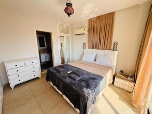 Aden Aparts - Central Kalkan 1 bedroom Flat with Pool & Sea View