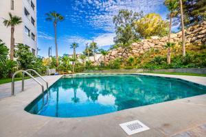 Seaview 2BR Apt Near Beach, AC, Pool, Balcony