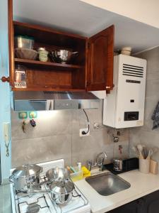 Comodo Departamento microcentro 1D, Confiable, con Balcon vista al cerro