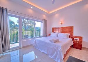 Ice Cliff Resort Munnar by VOYE HOMES Premium Stay with Pool