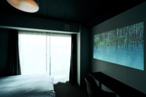 Rakuten STAY Kyoto Station Twin Room with ceiling projector