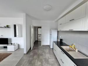 UNITY APARTMENTS Coresi Mall