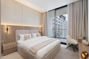 Vogue Vacation Homes, JVC Binghatti Phoenix near Circle Mall, One Bedroom Apartment with Balcony and Access toAmenities