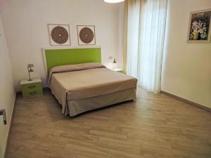 Apartment Quadrilocale in villa con piscina by Interhome