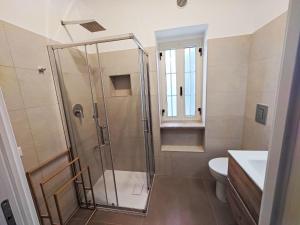 Apartment Quadrilocale in villa con piscina by Interhome