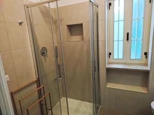 Apartment Quadrilocale in villa con piscina by Interhome