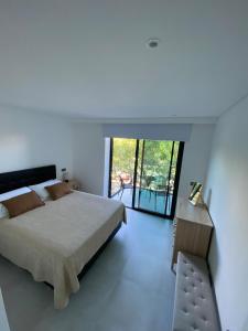 New 1-Bedroom Apartment with Pool Near the Beach