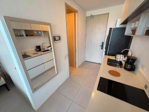 Suite con Jacuzzi y Vista Lateral al Mar