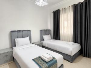 Pro Club Appartements - 2&3BR - Wifi - 2min Beach Away