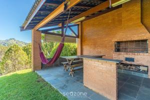 Casa espaçosa clareira em Campos do Jordão MCD002