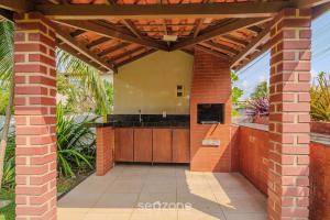 Casa c Churrasq. e Piscina em Jacuípe - PDA0736