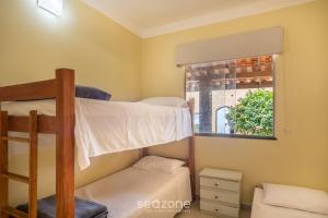 Casa c Churrasq. e Piscina em Jacuípe - PDA0736