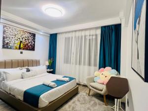 Elegant escape apartment with free parking space,fully equipped gym, swimming pool children playing ground area and amazing city views