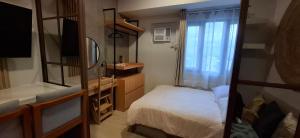 A cozy 1BR by Fern at Grass Residences