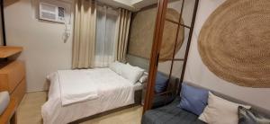 A cozy 1BR by Fern at Grass Residences