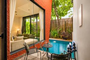 ELIVAAS Signature Solena 4BHK Villa with Private Pool, Bar Lounge, Terrace Views, Lift & Peaceful Pilerne Location Pet-friendly