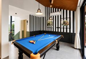 ELIVAAS Signature Solena 4BHK Villa with Private Pool, Bar Lounge, Terrace Views, Lift & Peaceful Pilerne Location Pet-friendly