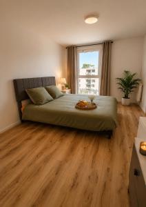 Appartement 2 chambres avec terrasse et parking privé - Proche gare et Paris