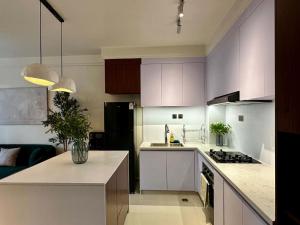 Misty Springs 1BR Apartment with a Pool, Gym & Kids Play Area