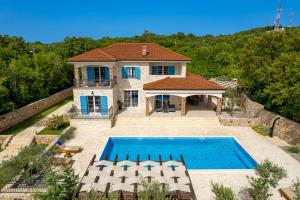 Luxury house with heated pool -60m2 and beautiful garden - by TRAVELER tourist agency Krk - ID 2382