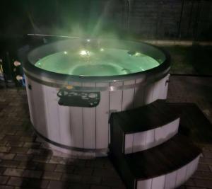 Ferienhaus Baltica 55qm bis 6 Gäste mit Sauna, Whirlpool, gemütlicher Terrasse, eingezäuntem Garten & bis zu 6 Hunde kostenlos