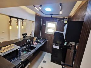 El Essam Pyramids View Luxury Apartment - شقة آل عصام الفندقية الفاخرة - إطلالة الأهرامات