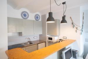 Apartamento Ivet con piscina comunitaria y a pie de la playa
