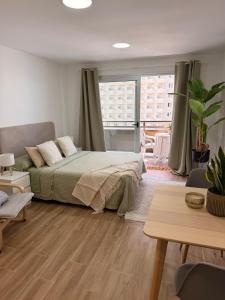 Charming studio with pool next to the beach