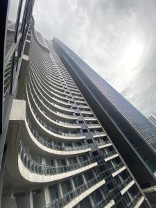 Spacious High Ceiling 2 BR 66th Flr corner unit with Balconies - FREE Sauna Pool Gym View of Skyline Manila Bay-Sunset