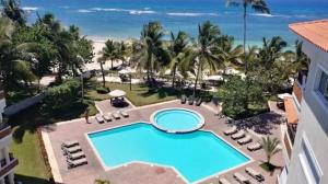 Apartamento Frente al Mar Caribe, Playa Juan Dolio, RD - Ideal Para Disfrutar de Escapadas con Familia y Amigos - Opciones de 2 y 3 Habitaciones