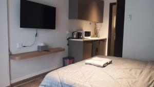 Azure Suites Apartment Batam - AOSIS Room