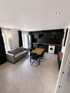 Location appartement T2 dans un pavillon avec terrasse sur jardin