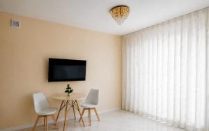 Nowy ! Apartament Premium z Wanną !!! blisko -Manufaktury -Orientarium ZOO -Aquapark Fala ! Centrum ! Prywatny !!! Zamykany !!!Parking !!! -Gratis - na pilota -Smart TV -WiFi -Zmywarka -Pralka -Ekspres do Kawy Cicha ! Prywatna Okolica W pełni wypos