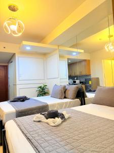 Shell Residences Combined rooms By Mae