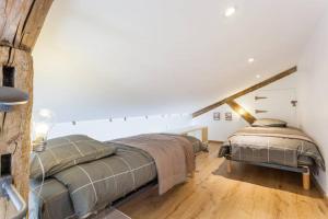 Maisons de vacances Loft cote jardin : photos des chambres