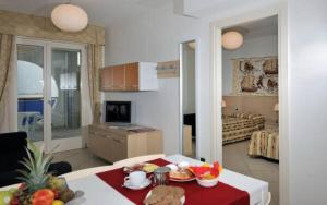 Beachfront apartment with terrace and shared pool