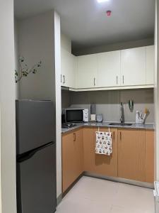 Muji 1BR in Uptown Parksuites BGC