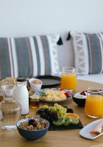 Sea Whisper Suites with private Cycladic patio and heated pool - sea side
