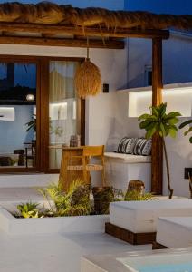 Sea Whisper Suites with private Cycladic patio and heated pool - sea side