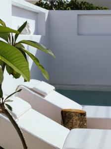 Sea Whisper Suites with private Cycladic patio and heated pool - sea side