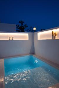 Sea Whisper Suites with private Cycladic patio and heated pool - sea side