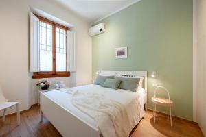 Luminoso Appartamento con Giardino e Terrazza Privati - 2 Camere - Parcheggio Comodo
