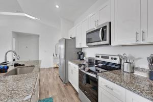New With heated Pool and Pier! Ideal for 2 Families!