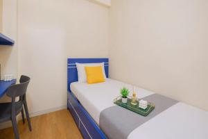 Combined and Spacious 3BR at Green Pramuka City Apartment By Travelio